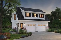 a white two story house with three windows on the top floor and an attached garage