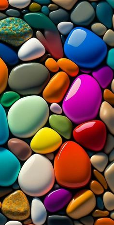 many different colored rocks and pebbles together