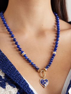 Take a close look at Sydney Evan's necklace and you'll see the heart charm it's strung with features the brand's signature 'Icon' motifs nestled inside - detach it on days you're after a more pared-back look. It's made from 14-karat gold and lapis lazuli and dusted with 1.28-carats of shimmering diamonds throughout. Floral Dresses Short, Sydney Evan, Raffia Bag, Boot Pumps, Beauty Accessories, Lapis Lazuli, Heart Charm, Jewellery And Watches, Diamond Necklace