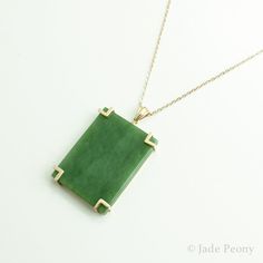 "AAA Siberian Nephrite Jade Necklace - Emerald Green Nephrite Jade - Rectangular Pendant - Statement Necklace - 18kt Yellow Gold Modern with a touch of art deco, this natural untreated Siberian nephrite jade will make the perfect 35th anniversary gift. - - - - - - - - - - - - - - - - - - - - - - - - - - - - - - - - - - - Stone: Siberian Nephrite Jade Size: 40mm length x 30mm width x 6.5mm thick Setting: 18kt Solid Yellow Gold, 8\" chain 100% genuine jade. We work with nephrite jade in its natura Elegant Rectangular Jade Necklace, Rectangular Jade Gemstone Necklaces, Rectangular Jade Gemstone Necklace, Classic Green Necklace With Rectangular Pendant, Green Rectangular Necklace For Formal Occasions, Formal Yellow Gold Jade Necklace, Formal Green Rectangular Necklace, Green Rectangular Pendant Necklace For Formal Occasions, Formal Green Necklace With Rectangular Pendant