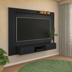 a flat screen tv mounted to the side of a wall