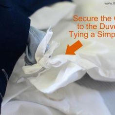 a white shirt with an orange arrow pointing to the cover on it's collar