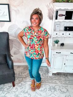 Some tops make a subtle statement. This isn’t one of them. Its notched V-neck and short sleeves keep things chic. Pair this top with your favorite distressed denim for a laid-back boho vibe or a structured blazer for a splash of color in the office. However you style it, one thing’s for sure: in this scene-stealing top, you’ll be the center of attention. After all, when you’ve got a silhouette this flattering, the only option is to make a memorable impression. Figure it out? This top already has Structured Blazer, Boho Vibe, Figure It Out, Distressed Denim, Color Splash, Short Sleeves Tops, How To Memorize Things, Short Sleeves, Blazer