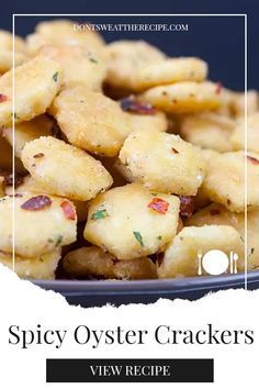 spicy oyster crackers on a plate with text overlay