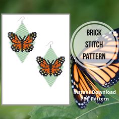 two orange and black butterfly earrings with the words brick stitch pattern hanging from them on a green leaf