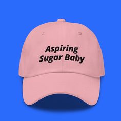 "It's everybody's dream... Be sure to pick up our new HILARIOUS hat design from HilariouSticker! This 20% sale will only be available for a short time after launch, so don't lose out! Comes in 6 different colors! Aspiring Sugar Baby Hat | Custom Design Funny Hat, Funny Hat for Teens, Funny gift for friends, funny hat for friends, funny hat for adults, adult humor hat clothing, sarcastic humor * 100% chino cotton twill * Green Camo color is 35% chino cotton twill, 65% polyester * Unstructured, 6- Playful Baseball Cap With Letter Print, Playful Letter Print Baseball Cap, Letter Print Cap, One Size Fits Most, Letter Print Hat With Short Brim, Funny One-size Dad Hat Baseball Cap, Cute Cotton Hat With Letter Print, Playful Hats With Letter Print And Curved Brim, Fun Cotton Baseball Cap With Letter Print, Fun Cotton Letter Print Baseball Cap