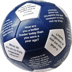 a blue and white soccer ball with words written on the side that read how are you better than you were a year ago?