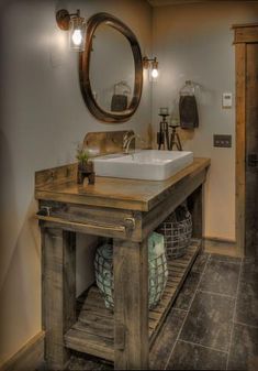 a bathroom sink sitting under a mirror next to a wooden cabinet and counter top in front of a doorway