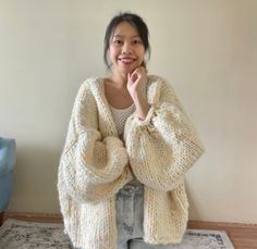 Chunky cardigan. Super soft and comfortable to wear. Hand knit with pure  wool 5WPI,  1,200 -1,300 grams Size : Width 30 Inches Length 21 Inches  P.s. Model wearing cardigan is 5'3 / 104 lbs. Made to order takes 1-2 week to knit and shipping. I am happy to knit custom sweater if you would love to have other colors or design, just feel free to message me! Care: hand wash in cold water not over 30 degree, lay flat to dry. Chunky Cardigan Outfit, Knit Cardigan Outfit, Big Cardigan, Pastel Cardigan, Neon Pastel, Hand Knit Cardigan, Cardigan Handmade, Chunky Cable Knit Cardigan, Thick Cardigan