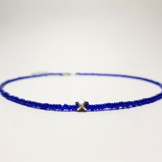 Blue choker necklace Dainty choker Star beaded necklace choker Beach choker Boho necklace Choker collar Silver star necklace choker The glass beaded star choker is 13 inches and can be adjusted up to 15 inches with a 2 inches extender chain. Made from 2mm tiny glass seed beads. This necklace has a dainty look and is crafted sturdy enough to wear every day. Every piece is made to order with care and love. ✓ HOW TO ORDER: ♥ Choose the color of your choice ♥ Choose the size of your choice ♥ If you Minimalist Blue Beaded Choker Necklaces, Minimalist Blue Beaded Choker Necklace, Adjustable Star Charm Necklace For Summer, Trendy Blue Choker With Tiny Beads, Adjustable Star-shaped Beaded Necklace Gift, Adjustable Blue Beaded Star Necklaces, Adjustable Blue Star-shaped Beaded Necklace, Blue Adjustable Star-shaped Beaded Necklaces, Blue Choker As Summer Gift