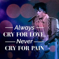 a man with a guitar in front of a microphone that says, always cry for love never cry for pain