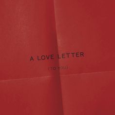 a red piece of paper with the words a love letter to you written on it