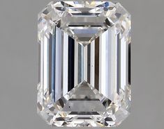 an emerald - cut diamond is shown in this undrecognized image, which appears to be part of a jewelry collection