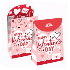 two valentine's day gift bags with hearts and envelopes on the front, one is