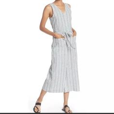 Beachlunchlounge Lennon Waist Tie Striped Jumpsuit Size Xs Beachlunchlounge White Blue Beach Lunch Lounge Lennon Romper/Jumpsuit New Beach Lunch Lounge Lennon Striped Jumpsuit In White, Blue. Size Medium. New With Tags. No Visible Flaws. - Linen-Cotton Jumpsuit - V Neckline - Pockets - Wide-Leg Cropped Pants - Matching Self-Belt - Nautical Stripes Ships Quickly And Bundle Deals Are Available! Bundle To Save Beach Lunch, Nautical Stripes, Cotton Jumpsuit, Romper Jumpsuit, Wide Leg Cropped Pants, Blue Beach, Striped Jumpsuit, Waist Tie, Cropped Pants