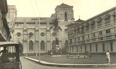 an old black and white photo of a city street