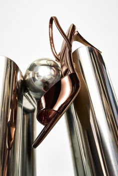 a close up of a metal object on a white background with no people in it