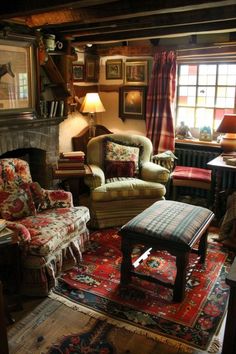 a living room filled with furniture and a fire place