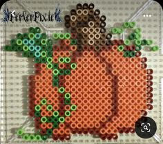 an image of a pumpkin made out of perler beads