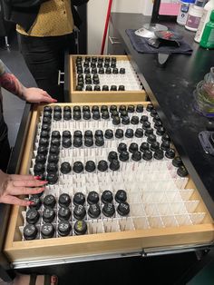 two women are looking at an abacus in a room