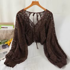 Loose, bat long sleeve lace top, short cut backless shirt top,cheap on saleMaterial:laceColor:white,black,brownStyle:sexyFeatures:bat long sleeveSize(CM):free 1inch=2.54cmlength:39,shoulder :29,bust:100,sleeve:62&ltp&gtAll items will arrive in 20-25 business days, if you have an emergency, please contact us to upgrade logistics.</p>&ltbr/>&ltp&gtNeed to add 16 dollars fast shipping(Arrive in 10-14 days).</p>&ltbr/> Brown Lace Outfit, Brown Long Sleeve Party Tops, Long Sleeve Brown Crop Top For Spring, Brown Long Sleeve Blouse For Party, Brown Long Sleeve Party Blouse, Brown Long Sleeve Crop Top For Summer, Fitted Brown Lace Top, Brown Fitted Lace Top, Brown Lace Tops For Spring