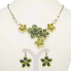 Ready-to-wear necklace and earring set features multicolored flowers and gold-finished steel. Colors, shapes and sizes may vary in each lot. Nickel-free Green Flower Pendant Jewelry, Green Alloy Jewelry For Gift, Green Metal Flower Jewelry, Green Metal Flower-shaped Jewelry, Nickel-free Enamel Flower Jewelry, Nickel-free Green Flower Shaped Jewelry, Green Nickel-free Flower-shaped Jewelry, Green Flower-shaped Enamel Jewelry, Green Flower Charm Jewelry