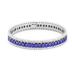 Italian Designer Sapphire and Diamond Bangle - 18K White Gold - Sapphire: 8.77ct. Diamond: 2.28ct.-Da Vinci Fine Jewelry Blue Sapphire Bracelets With Hand Set Details, Blue Sapphire Bracelets Hand Set, Sapphire Tennis Bracelet With Jubilee Design, Luxury Blue Gemstone Bangle, Formal Blue Diamond Bracelet Hand Set, Formal Blue Tanzanite Bracelets, Sapphire Bracelet With Prong Setting, Blue Sapphire Diamond Bracelet For Wedding, Blue Bangle Tennis Bracelet For Formal Occasions