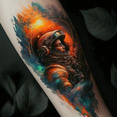 an astronaut tattoo on the arm