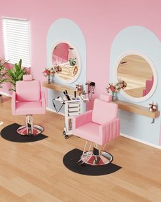 two pink chairs sitting on top of a hard wood floor next to a mirror and potted plant