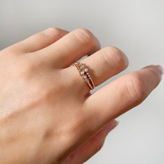 This stunning beaded ring features diamonds that shine beautifully in the light. Handcrafted with care, it adds the perfect amount of sparkle to any outfit. -------- FEATURES: -Gold Kt: 14K Solid Gold   -Custom Gold Color: White & Rose Gold -White Diamonds 0.13 CTW -Diamond Color Clarity: G Color SI Clarity -Diamond Cut: Round -Stone Sizes: 2.2mm & 1.5mm -Setting Type: Bezel -Ready to Ship in 1-2 Business Days -Direct Message us for ring size -Packed in labeled gift box -The perfect birthday or holiday (Christmas, hanukah, valentines day...etc.) gift!  -FREE shipping on all U.S. orders  Contact us with any inquiries by Etsy convo or by email: contact@letrem.com Want to find out more? Check out my shop https://www.etsy.com/shop/letreaime ❤ Share the Love PIN IT on PINTEREST FOLLOW on Instag Diamond Packaging, Minimalist Gold Jewelry, Gold Minimalist Jewelry, Logo Jewelry, Beaded Ring, Bezel Set Diamond, Box Delivery, Gold Stone, Diamond Set