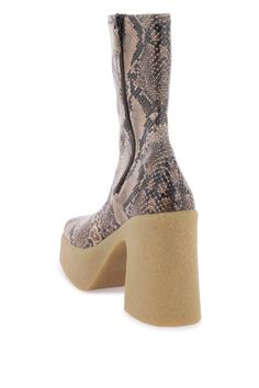 Stella McCartney ankle boots made of stretch Alter Python, characterized by the Skyla wedge and textured rubber platform. Square toe, side zip closure, fabric lining. Stella Mc, Wedge Ankle Boots, Roberto Cavalli, Victoria Beckham, Python, Jimmy Choo, Stella Mccartney, Side Zip, Balenciaga