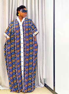 Made with 100% Ankara cotton Measures 63 inches in length Pockets on both sides Button down detail Size chart is in Uk sizing Please check our conversion chart too Plus Size African Fashion, Maxi Dress Ankara, African Maxi Dress Ankara, African Maxi Dress, Plus Size African, Ankara Maxi Dress, Dress Ankara, Kimono Maxi Dress, Maxi Kimono