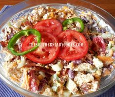 a glass bowl filled with lots of food