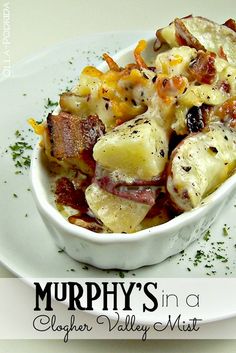 a white bowl filled with potatoes and bacon