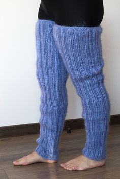 "HAND KNITTED GAITERS / LEG WARMERS ### DESIGNED & CREATED by Giorgio Qualitat ### Product Specification: § Color: Blue; § Style: Ribbed hand knitted gaiters; § Material: 2 strands premium class mohair; Size & Measurements: § Length: 31.5 \" / 80 cm § Circumference at the upper end: 18.1 '' / 46 cm § Circumference at the lower end: 9.4 '' / 24 cm § Net weight: 402 g* All measurements are taken with the item laid flat and not stretched. The lady modeling has a circumference - at thigh - 24.1\" - Cozy Handmade Knitting Pattern, Casual Blue Stretch Leg Warmers, Cozy Fitted Hand Knitted Pattern, Blue Fitted Casual Leg Warmers, Casual Fitted Blue Leg Warmers, Fitted Blue Leg Warmers For Winter, Blue Fitted Leg Warmers For Winter, Cozy Blue Leg Warmers For Winter, Knitted Blue Leg Warmers For Winter