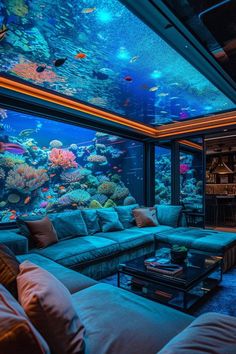 a living room filled with furniture and an aquarium