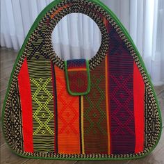 This Bright Beautiful Bag Is Perfect For Spring And Summer. It Has One Large Internal Pocket And Opening Fits Comfortably Over Your Shoulder. Artisan Made. Multicolor Handheld Hobo Bag For Everyday Use, Multicolor Woven Hobo Tote Bag, Multicolor Woven Hobo Bag, Multicolor Rectangular Hobo Bag With Braided Handles, Multicolor Detachable Handle Hobo Shoulder Bag, Multicolor Hobo Shoulder Bag With Detachable Handle, Colorful Woven Tote Shoulder Bag, Daily Use Multicolor Hobo Bag With Braided Handles, Multicolor Shoulder Hobo Bag For Market