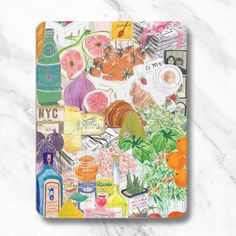 a cutting board covered in lots of different types of food and drinks on top of a marble surface