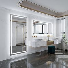 a bathroom with two sinks, mirrors and a large mirror on the wall above it