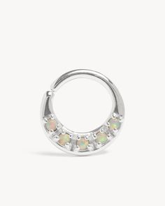 "Opal Nose ring piercing, septum ring. Bohemian Jewelry India style. Sold by piece. M A T E R I A L S ∙ & ∙ S I Z E Made of solid 925 Sterling Silver with five 2mm round Opal inlays Hypo-Allergenic materials for sensitive skin Septum Thickness Size > 16g (1.3mm) and 14g (1.6mm) Septum Diameter (hole inside ) > 8.5mm (about 5/16\") Septum Outside Size (Bottom to Top) > 13.5mm (about 9/16\") S E E * M O R E Matching Designs > https://www.etsy.com/shop/revelmy?ref=seller-platform-mc Sterling Silver Birthstone Piercings, Silver Opal Jewelry With Halo, Internally Threaded Silver Septum Ring, Silver Hoop Septum Ring Stackable, Minimalist Round Ring, Nickel Free Sterling Silver Belly Rings, Nickel-free Sterling Silver Belly Rings, Nickel-free White Gold Septum Ring, Silver Stackable Septum Ring