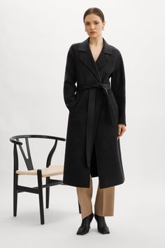 Every closet needs a classic tailored wool coat to effortlessly layer as you transition into colder seasons. Ours is cut from double faced wool for added warmth to block out the cold. It features an asymmetric single button closure and self tie at waist allowing you to change up the look. Tailored Wool Coat, Closet Needs, Black Wool Coat, Wool Overcoat, Long Wool Coat, Wrap Coat, Work Clothes, Womens Size Chart, Knit Shirt