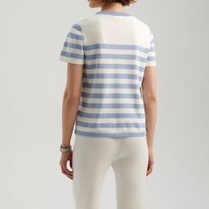 Discover Elegance and Comfort Embrace a blend of elegance and casual style with our Striped Knit T-Shirt, perfect for the modern woman. Designed to enhance your summer wardrobe, this top features a classic striped pattern that complements any outfit, making it a must-have for your fashion lineup. Product Features Fabric Composition: Crafted from a mix of polyester, viscose, and polyamide, offering a soft, breathable feel with slight stretch for comfort. Design: Timeless black and white stripes with a slim fit design to accentuate your silhouette. Convenience: Easy to care for and maintains its shape, even after multiple washes. Versatility: Ideal for various occasions, from casual outings to more formal settings. Size Bust Shoulder Sleeve length Length Unit CM Inch CM Inch CM Inch CM Inch Chic Striped Crew Neck T-shirt, Casual Striped Collar Crew Neck Top, Casual Crew Neck Top With Striped Collar, Casual Fitted Tops With Horizontal Stripes, Fitted Casual Tops With Contrast Stripes, Casual Fitted Top With Contrast Stripes, Fitted Casual Top With Contrast Stripes, Chic Knit T-shirt For Spring, Casual Fitted Top With Striped Hem