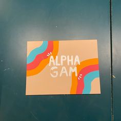 a sticker on the side of a door that says, alpha gam