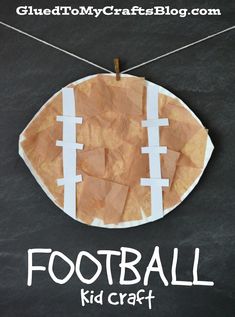 a piece of paper that has been cut in half to make a football ornament