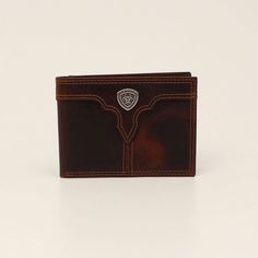 Brown leather bifold with western yoke and Ariat logo in the center Ariat Logo, Bifold Wallet Men, Brown Fits, Mens Wallet, M F, Bifold Wallet, Stay Organized, Small Leather Goods, Wallet Men