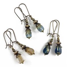 These handmade czech glass teardrop dangles are perfect to add a little sparkle to any outfit! Boho style dangle earrings featuring your choice of coloured czech glass teardrop beads with a rustic picasso finish, and natural brass ear wires - perfect for everyday wear!The earrings measure approx. 1 7/8" from the top of the ear wire to the bottom of the tear drop bead.Please note that this listing is for 1 - pair of earrings only, in your choice of colour;~ dark blue~ dark amethyst purple~ light Diy Earrings Dangle, Czech Beads Jewelry, Lucite Flower Earrings, Earrings Handmade Boho, Dark Amethyst, Vintage Jewelry Ideas, Outfit Boho, Light Sapphire, Dope Jewelry