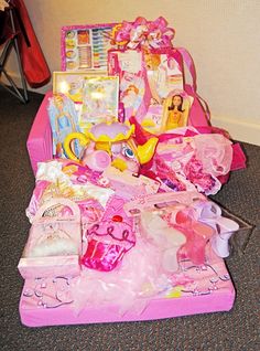 a pink trunk filled with lots of toys