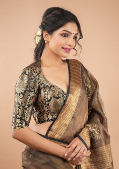 This Blouse has all the elements  to complete your saree ensemble! It is set in a stylish front and back neck pattern and the Banarasi brocade fabric adds opulence! Need minor customizations such as altering the sleeve length or neckline? Or if you are looking for a custom size. Ask us and we will try our best to make it happen! SIZE GUIDE : To determine your blouse size, please measure around the fullest part of your bust line using a measuring tape. Your bust measurement will correspond to the Whatsapp Widget, Banarasi Brocade Fabric, Brocade Blouse Designs, Designer Blouses Online, House Of Blouse, Banarasi Brocade, Latest Blouse Designs Pattern, Sari Design, Best Blouse Designs