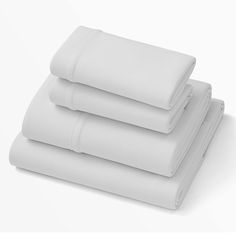 four white sheets stacked on top of each other