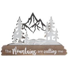 a wooden sign that says the mountains are calling me